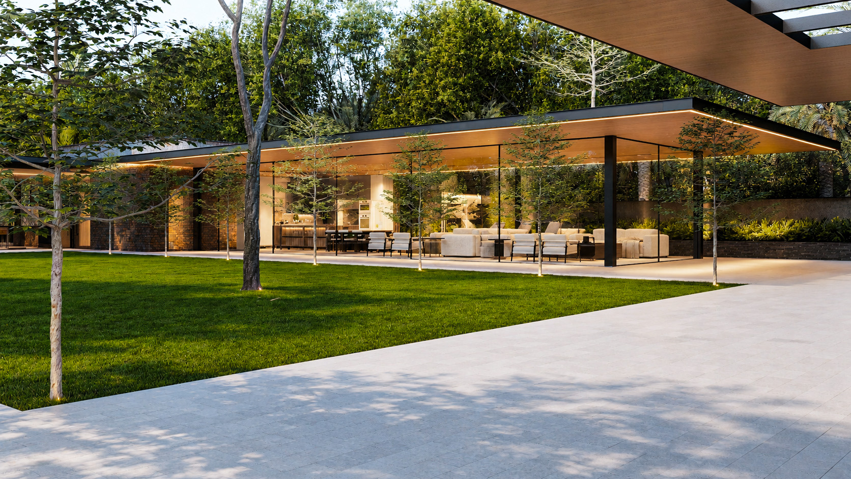 Single-storey glazed annex building set within the garden