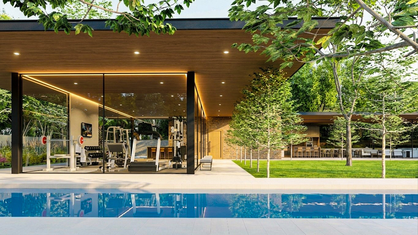 Poolside view toward the glazed gym and garden pavilion