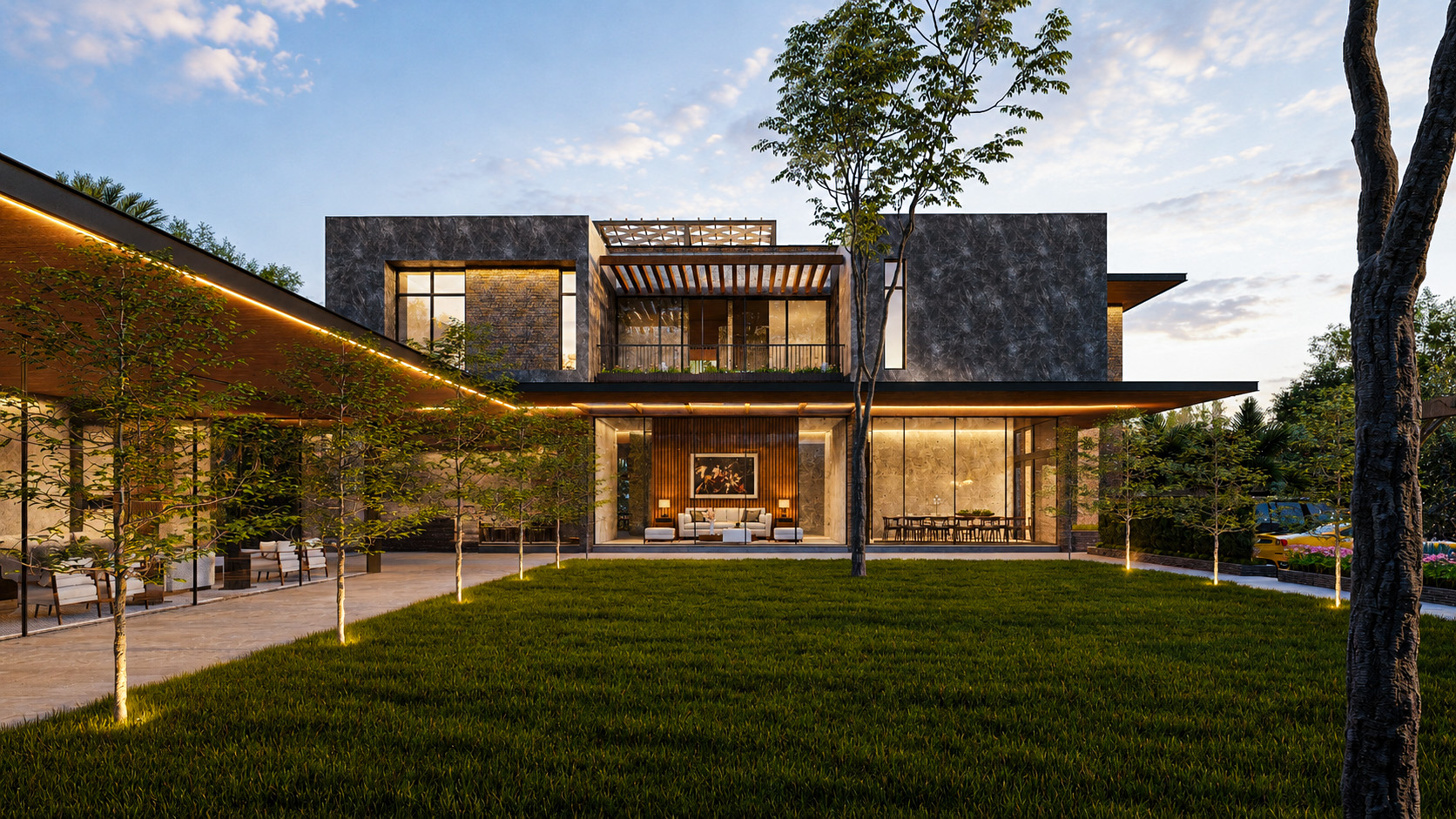 Rear elevation of the private villa opening onto its landscaped garden